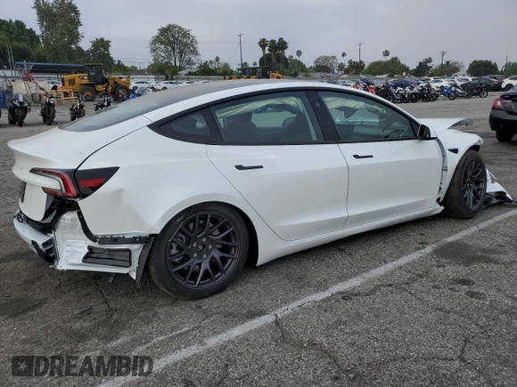 2025 Tesla Model 3 Long Range с VIN 5YJ3E1EA7SF001043, выставлен на аукционе Copart как лот 57250565 с пробегом 456 миль миль и Списание • Salvage title. История ставок и продаж доступна на DreamBid. Изображение 3.