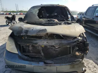 2004 Ford Freestar SE z VIN 2FMZA51674BB22374, wystawiony jako Copart lot #57065105 z przebiegiem Nie podano mil oraz Szkoda całkowita • Salvage title. Historia ofert i sprzedaży dostępna na DreamBid. Obrazek 5.