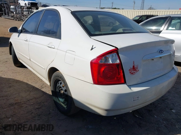 2004 Kia Spectra LX with VIN KNAFE121745036331, listed as a IAAI auction lot 41735613 with 67,634 mi miles. Bid and sale history available at carsss.com. Image 3.
