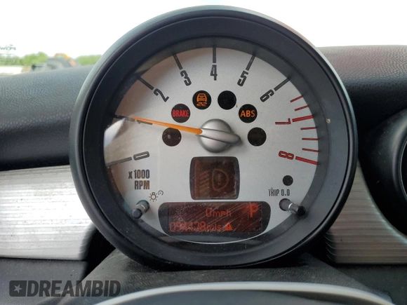 2011 MINI Hardtop with VIN WMWSU3C52BT094399, listed as a Copart auction lot 56561635 with 94,428 mi miles and Salvage Title. Bid and sale history available at DreamBid. Image 9.