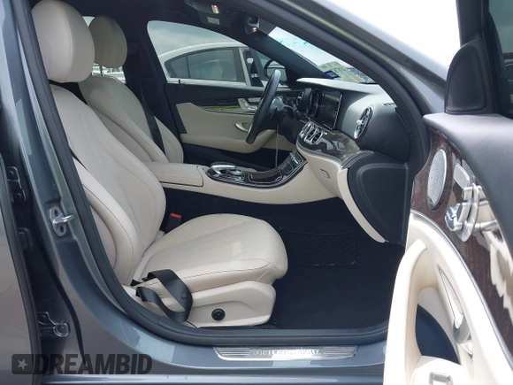 2019 Mercedes-Benz E 300 with VIN WDDZF4KB4KA489825, listed as a IAAI auction lot 41878228 with 55,029 mi miles and . Bid and sale history available at DreamBid. Image 5.