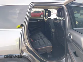 2013 Jeep Grand Cherokee Overland with VIN 1C4RJFCG2DC611877, listed as a IAAI auction lot 41910800 with 151,457 mi miles. Bid and sale history available at carsss.com. Image 8.
