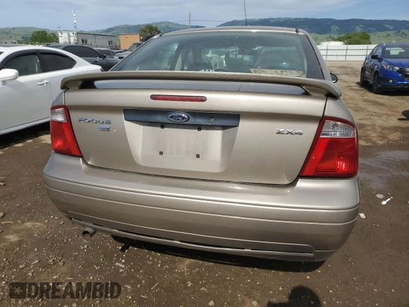 2005 Ford Focus S with VIN 1FAFP34NX5W263944, listed as a Copart auction lot 52973945 with 201,348 mi miles and Salvage Title. Bid and sale history available at carsss.com. Image 6.