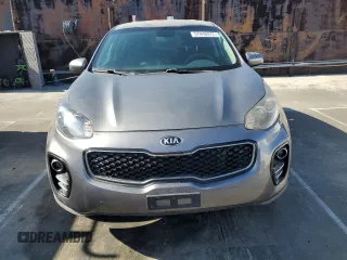 2017 Kia Sportage LX z VIN KNDPMCAC9H7086859, wystawiony jako Copart lot #57840475 z przebiegiem 96 890 mil mil oraz Czysty tytuł • Clean title. Historia ofert i sprzedaży dostępna na DreamBid. Obrazek 5.