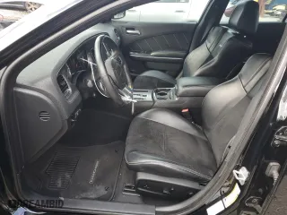 2012 Dodge Charger SRT8 with VIN 2C3CDXEJ2CH169792, listed as a Copart auction lot 88295065 with 107,255 mi miles and Salvage Title. Bid and sale history available at carsss.com. Image 7.