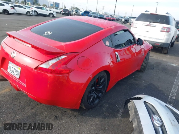2014 Nissan 370Z Nismo with VIN JN1AZ4EH9EM636306, listed as a IAAI auction lot 41467766 with 101,021 mi miles and . Bid and sale history available at DreamBid. Image 14.