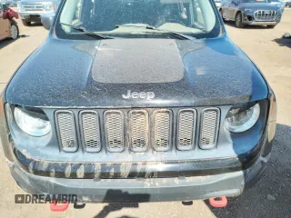 2015 Jeep Renegade Trailhawk z VIN ZACCJBCT9FPB21561, wystawiony jako Copart lot #63051673 z przebiegiem Nie podano mil oraz Szkoda całkowita • Salvage title. Historia ofert i sprzedaży dostępna na DreamBid. Obrazek 12.