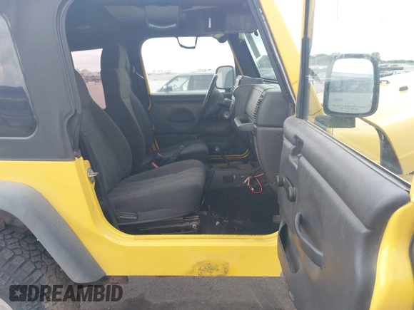 2005 Jeep Wrangler SE z VIN 1J4FA29S95P373313, wystawiony jako IAAI lot #42340611 z przebiegiem 162 801 mil mil oraz . Historia ofert i sprzedaży dostępna na DreamBid. Obrazek 5.