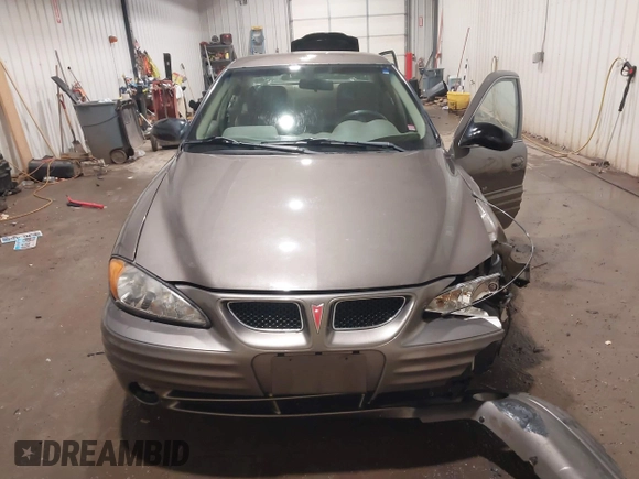 2002 Pontiac Grand Am SE1 z VIN 1G2NF52FX2C128240, wystawiony jako IAAI lot #41356415 z przebiegiem 15 900 mil mil oraz . Historia ofert i sprzedaży dostępna na DreamBid. Obrazek 12.