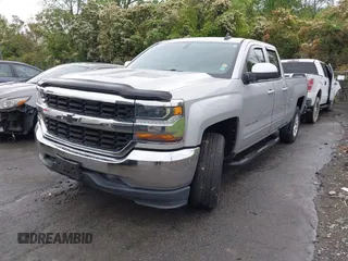 2018 Chevrolet Silverado 1500 LT with VIN 1GCVKREC7JZ151678, listed as a IAAI auction lot 41972011 with 106,892 mi miles and . Bid and sale history available at DreamBid. Image 2.