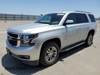 2015 Chevrolet Tahoe LT z VIN 1GNSKBKCXFR518344, wystawiony jako Copart lot #58259105 z przebiegiem 97 979 mil mil oraz Szkoda całkowita • Salvage title. Historia ofert i sprzedaży dostępna na DreamBid. Obrazek 1.