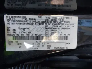 2013 Ford Focus SE with VIN 1FADP3K2XDL180319, listed as a IAAI auction lot 41697745 with 999,999 mi miles. Bid and sale history available at carsss.com. Image 9.