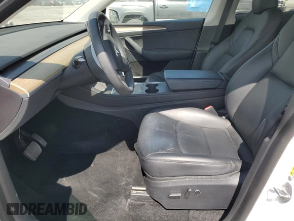 2023 Tesla Model Y Long Range z VIN 7SAYGDEE8PA030286, wystawiony jako Copart lot #50945465 z przebiegiem 43 676 mil mil oraz Szkoda całkowita • Salvage title. Historia ofert i sprzedaży dostępna na DreamBid. Obrazek 7.