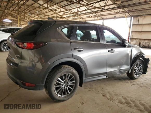 2020 Mazda CX-5 Touring with VIN JM3KFACM6L0804410, listed as a Copart auction lot 51009465 with 55,498 mi miles and Salvage Title. Bid and sale history available at carsss.com. Image 3.