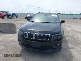 2019 Jeep Cherokee Latitude with VIN 1C4PJLCBXKD284954, listed as a IAAI auction lot 41877944 with 134,931 mi miles. Bid and sale history available at carsss.com. Image 12.