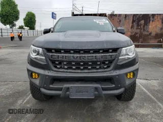 2021 Chevrolet Colorado 4WD ZR2 with VIN 1GCGTEEN3M1293299, listed as a Copart auction lot 59809995 with 21,890 mi miles and Salvage title. Bid and sale history available at DreamBid. Image 5.