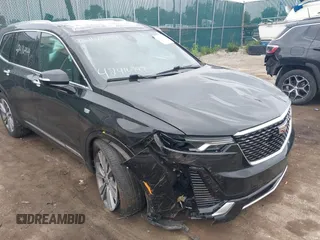 2020 Cadillac XT6 FWD Premium Luxury z VIN 1GYKPCRS6LZ148058, wystawiony jako IAAI lot #42416949 z przebiegiem 79 318 mil mil oraz . Historia ofert i sprzedaży dostępna na DreamBid. Obrazek 6.