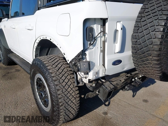 2021 Ford Bronco z VIN 1FMEE5DP7MLA93692, wystawiony jako IAAI lot #42222219 z przebiegiem 18 982 mil mil oraz . Historia ofert i sprzedaży dostępna na DreamBid. Obrazek 18.