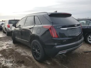 2021 Cadillac XT5 AWD Premium Luxury with VIN 1GYKNDRS9MZ141571, listed as a Copart auction lot 46450135 with 92,668 mi miles and Salvage Title. Bid and sale history available at carsss.com. Image 2.