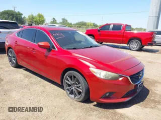 2014 Mazda 6 i Grand Touring с VIN JM1GJ1W67E1135023, выставлен на аукционе IAAI как лот 42021763 с пробегом 137 579 миль миль и . История ставок и продаж доступна на DreamBid. Изображение 1.