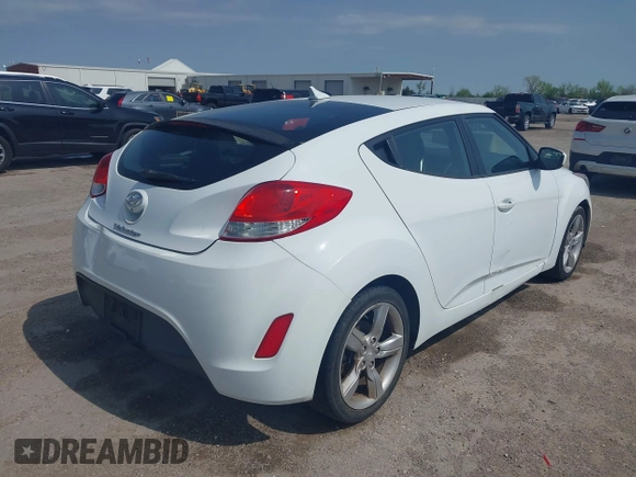 2014 Hyundai Veloster RE:FLEX z VIN KMHTC6AD5EU201168, wystawiony jako IAAI lot #41930766 z przebiegiem 198 909 mil mil oraz . Historia ofert i sprzedaży dostępna na DreamBid. Obrazek 4.