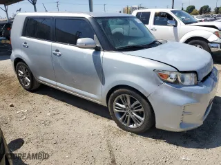 2013 Scion xB with VIN JTLZE4FE5DJ039321, listed as a Copart auction lot 52744485 with 128,536 mi miles and Salvage Title. Bid and sale history available at carsss.com. Image 4.