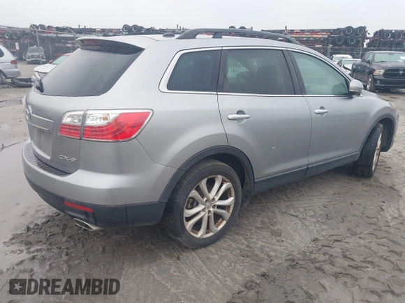 2012 Mazda CX-9 Grand Touring z VIN JM3TB2DA5C0363864, wystawiony jako IAAI lot #41896080 z przebiegiem 287 420 mil mil oraz . Historia ofert i sprzedaży dostępna na DreamBid. Obrazek 4.