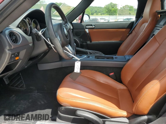 2008 Mazda MX-5 Miata Grand Touring z VIN JM1NC26F580144269, wystawiony jako Copart lot #56586405 z przebiegiem 52 871 mil mil oraz Szkoda całkowita • Salvage title. Historia ofert i sprzedaży dostępna na DreamBid. Obrazek 7.