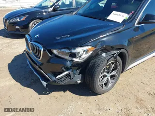 2018 BMW X1 sDrive28i with VIN WBXHU7C32J5L08316, listed as a IAAI auction lot 41647076 with 46,184 mi miles. Bid and sale history available at carsss.com. Image 6.