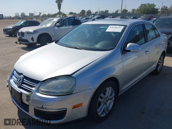 2008 Volkswagen Jetta SE z VIN 3VWRM71KX8M191212, wystawiony jako IAAI lot #42660632 z przebiegiem 198 459 mil mil oraz . Historia ofert i sprzedaży dostępna na DreamBid. Obrazek 17.