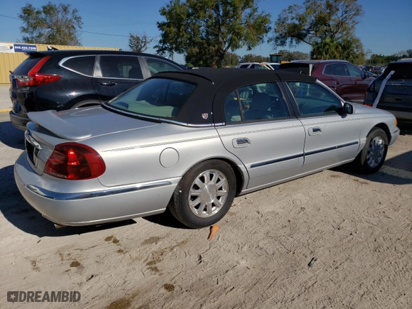 2001 Lincoln Continental with VIN 1LNHM97V31Y641106, listed as a Copart auction lot 77468194 with 86,363 mi miles and Clean Title. Bid and sale history available at carsss.com. Image 3.