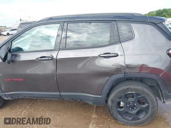 2023 Jeep Compass Trailhawk with VIN 3C4NJDDN9PT544283, listed as a IAAI auction lot 42393021 with 60,009 mi miles and . Bid and sale history available at DreamBid. Image 14.