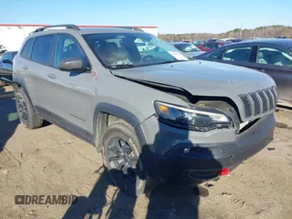 2019 Jeep Cherokee Trailhawk Elite with VIN 1C4PJMBX1KD401792, listed as a IAAI auction lot 41286027 with 70,236 mi miles. Bid and sale history available at carsss.com. Image 1.