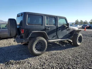 2018 Jeep Wrangler Unlimited Rubicon Recon with VIN 1C4BJWFGXJL899785, listed as a Copart auction lot 50102975 with 114,926 mi miles and Salvage Title. Bid and sale history available at DreamBid. Image 3.