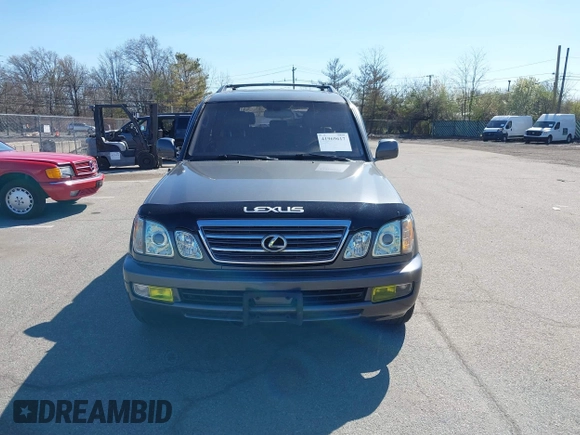 2003 Lexus LX with VIN JTJHT00W033531066, listed as a IAAI auction lot 41969617 with 209,710 mi miles. Bid and sale history available at carsss.com. Image 12.