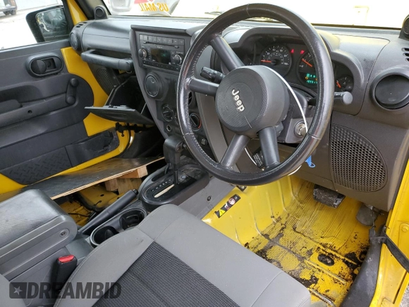 2008 Jeep Wrangler X z VIN 1J4FZ24118L511476, wystawiony jako Copart lot #85471624 z przebiegiem 189 917 mil mil oraz Nie do naprawy • Non repairable. Historia ofert i sprzedaży dostępna na DreamBid. Obrazek 8.