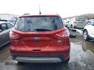 2016 Ford Escape SE with VIN 1FMCU9GXXGUB02932, listed as a IAAI auction lot 41797351 with 74,284 mi miles. Bid and sale history available at carsss.com. Image 16.