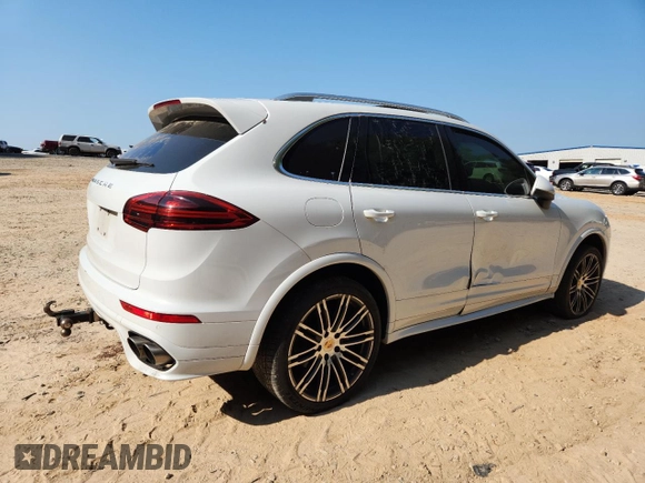 2015 Porsche Cayenne S with VIN WP1AB2A24FLA59813, listed as a Copart auction lot 60604305 with 137,719 mi miles and Salvage title. Bid and sale history available at DreamBid. Image 3.
