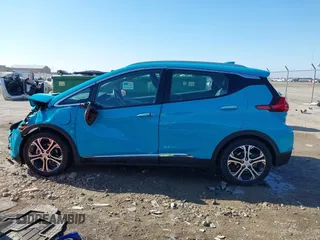 2020 Chevrolet Bolt EV Premier with VIN 1G1FZ6S0XL4121012, listed as a IAAI auction lot 41503991 with 56,957 mi miles and . Bid and sale history available at DreamBid. Image 14.