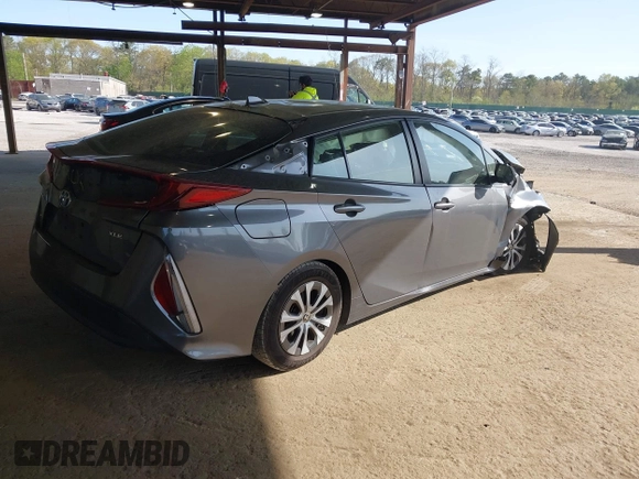 2021 Toyota Prius LE with VIN JTDKAMFP2M3168342, listed as a IAAI auction lot 42132946 with 69,628 mi miles and . Bid and sale history available at DreamBid. Image 4.