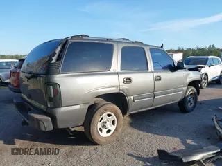 2001 Chevrolet Tahoe LS with VIN 1GNEC13T11R182692, listed as a IAAI auction lot 41511354 with 293,614 mi miles and . Bid and sale history available at DreamBid. Image 4.