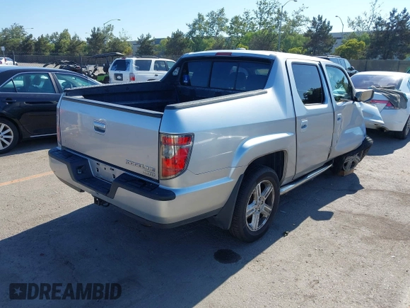 2012 Honda Ridgeline RTL with VIN 5FPYK1F56CB457687, listed as a IAAI auction lot 42582331 with 96,357 mi miles and . Bid and sale history available at DreamBid. Image 4.