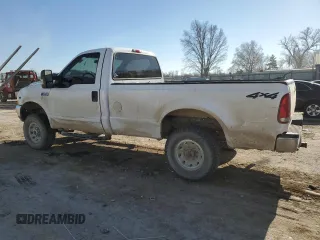 2001 Ford F-250 with VIN 3FTNF21L81MA77058, listed as a Copart auction lot 85871654 with 163,557 mi miles and Salvage title. Bid and sale history available at DreamBid. Image 2.