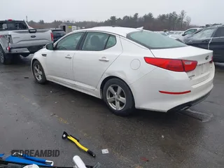 2015 Kia Optima LX with VIN KNAGM4A70F5571034, listed as a IAAI auction lot 41734211 with 214,948 mi miles. Bid and sale history available at carsss.com. Image 3.