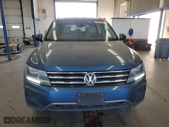 2019 Volkswagen Tiguan S with VIN 3VV0B7AX2KM197883, listed as a Copart auction lot 64978515 with 54,961 mi miles and Salvage title. Bid and sale history available at DreamBid. Image 5.