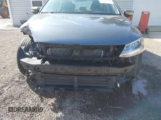 2015 Volkswagen Jetta Sedan 1.8T SE w/Connectivity with VIN 3VWD07AJ2FM312146, listed as a IAAI auction lot 41843238 with 107,741 mi miles. Bid and sale history available at carsss.com. Image 6.
