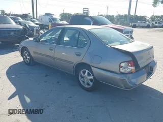 1999 Nissan Altima XE with VIN 1N4DL01D1XC255927, listed as a IAAI auction lot 42003101 with 154,000 mi miles. Bid and sale history available at carsss.com. Image 3.