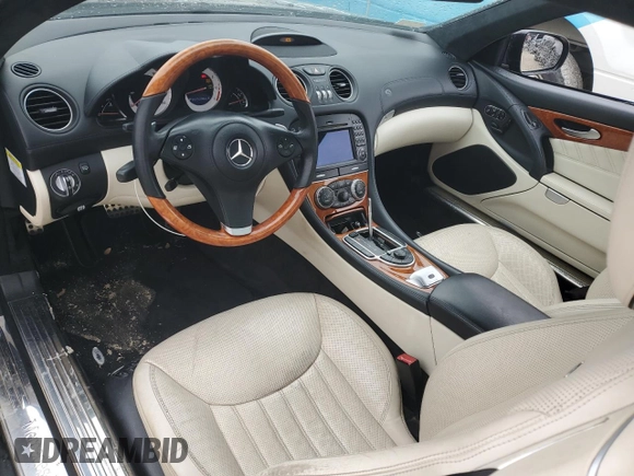 2009 Mercedes-Benz SL 550 с VIN WDBSK71F39F152619, выставлен на аукционе Copart как лот 43771145 с пробегом 106 402 миль миль и Списание • Salvage title. История ставок и продаж доступна на DreamBid. Изображение 8.