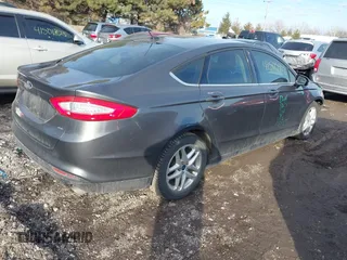 2015 Ford Fusion SE z VIN 3FA6P0H70FR303589, wystawiony jako IAAI lot #41505903 z przebiegiem 206 307 mil mil oraz . Historia ofert i sprzedaży dostępna na DreamBid. Obrazek 4.