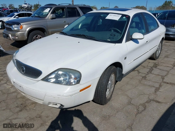 2004 Mercury Sable LS Premium with VIN 1MEHM55S64G610527, listed as a IAAI auction lot 41739433 with 34,409 mi miles. Bid and sale history available at carsss.com. Image 2.
